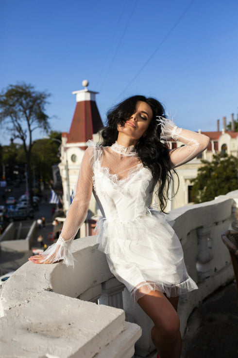 Wedding dress with feathers